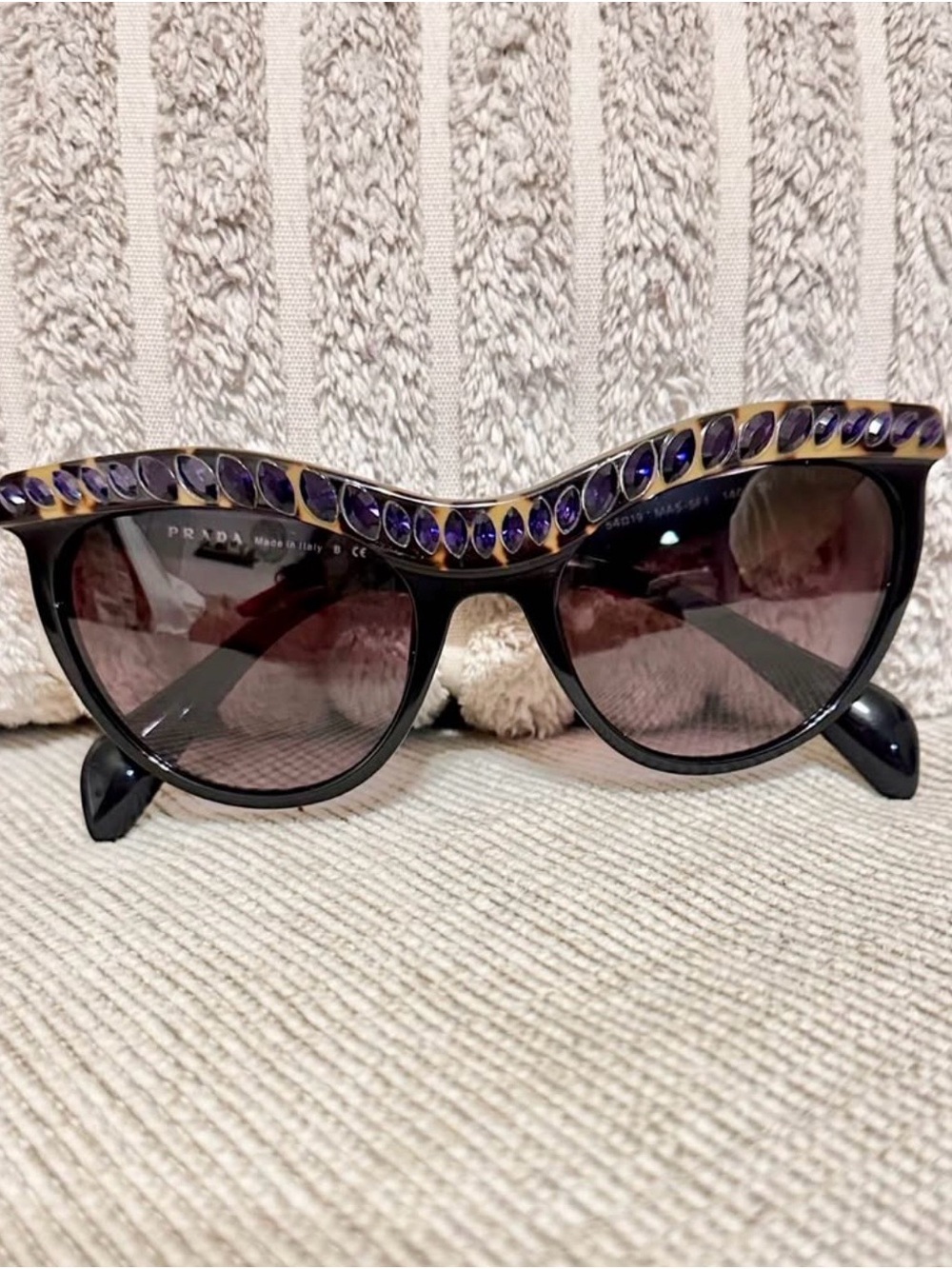 Prada Black Cat-Eye Sunglasses with Purple Crystal Trim